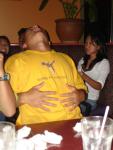 Kenny rubbing his full tumm