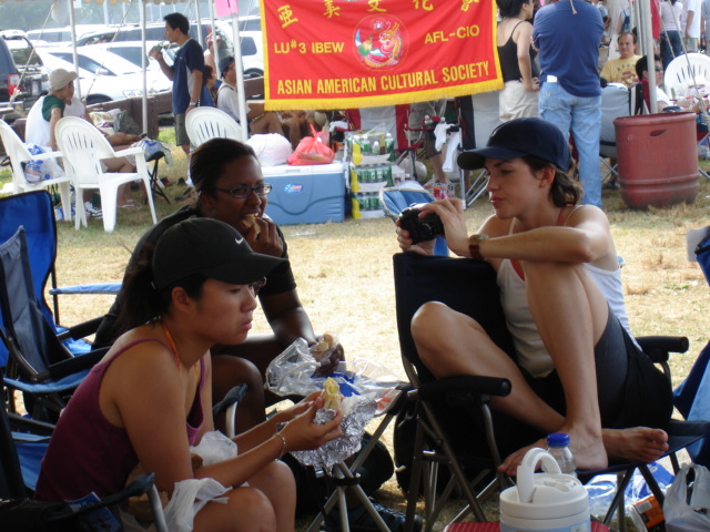 Jian and Zola eating and Lucy with a Camera