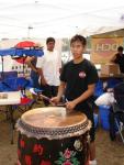 Garture Playing his Drum