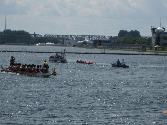 Men's Best of the Fest 100M final. DCH boat is flipped.