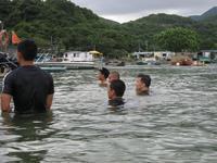 pee-ing in warm water.