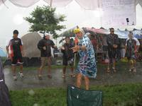 Luis's trash bag rain poncho. And DCH jumping jacks in the rain.